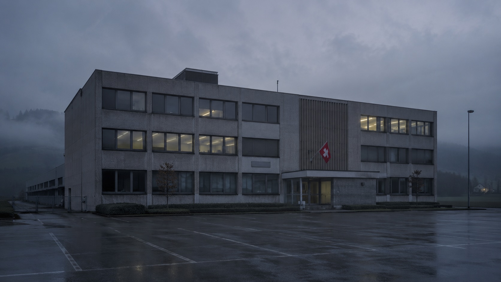 The nondescript Crypto AG headquarters in Steinhausen, Zug Switzerland — the Swiss encryption company secretly owned by the CIA and BND for over 50 years under Operation Rubicon