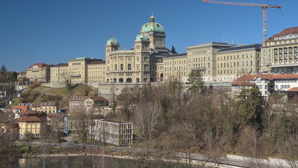 Capital of Switzerland: the Federal Palace in Bern seen above the Aare river