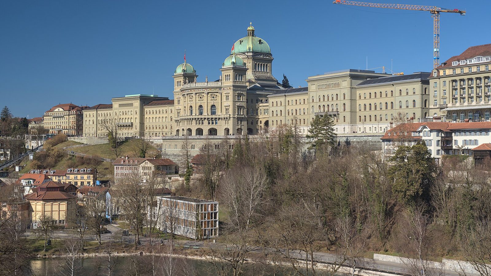 Capital of Switzerland: the Federal Palace in Bern seen above the Aare river