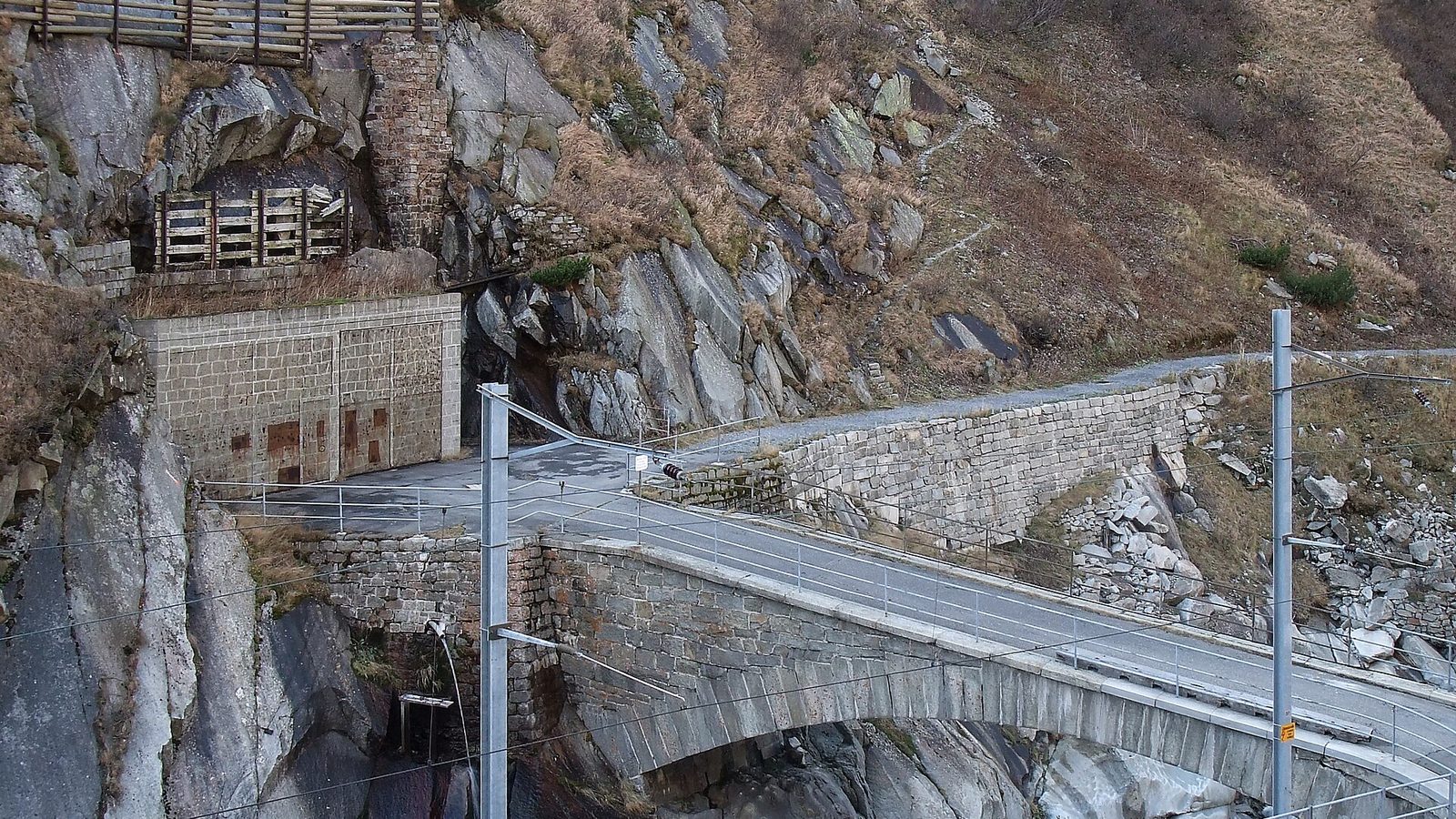 A fortified entrance and bridge cut into the granite of the Schöllenen gorge on the route up to Andermatt